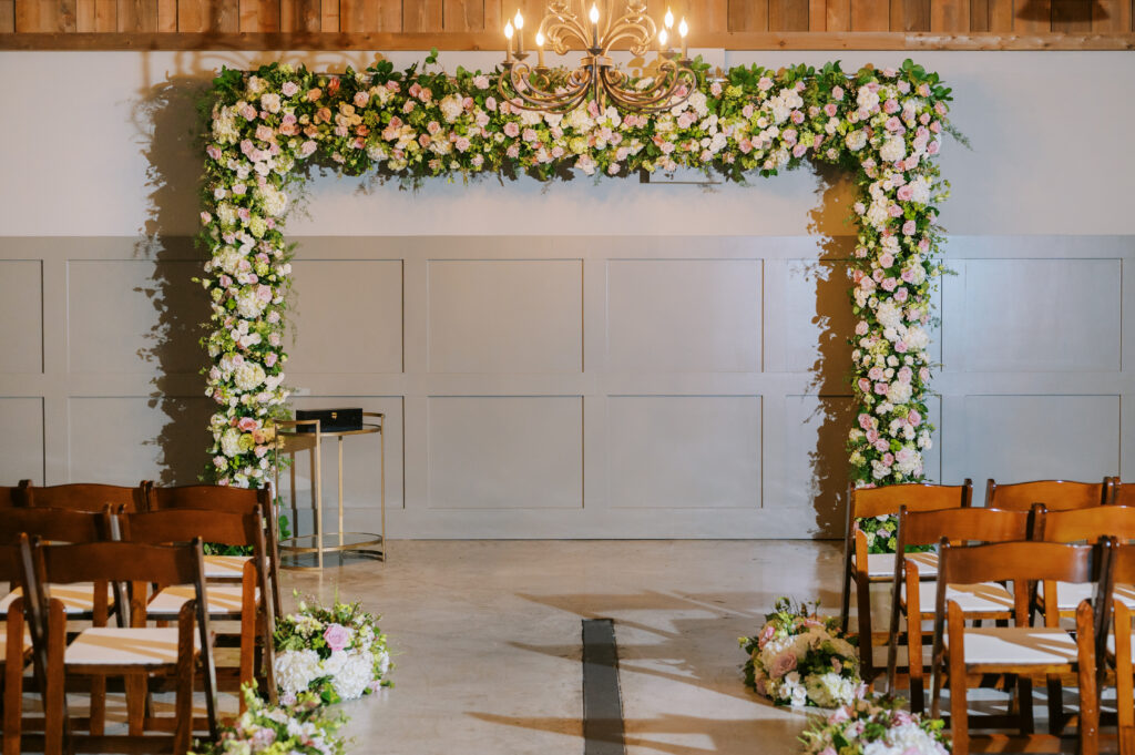 Ceremony backdrop with stunning floral arch