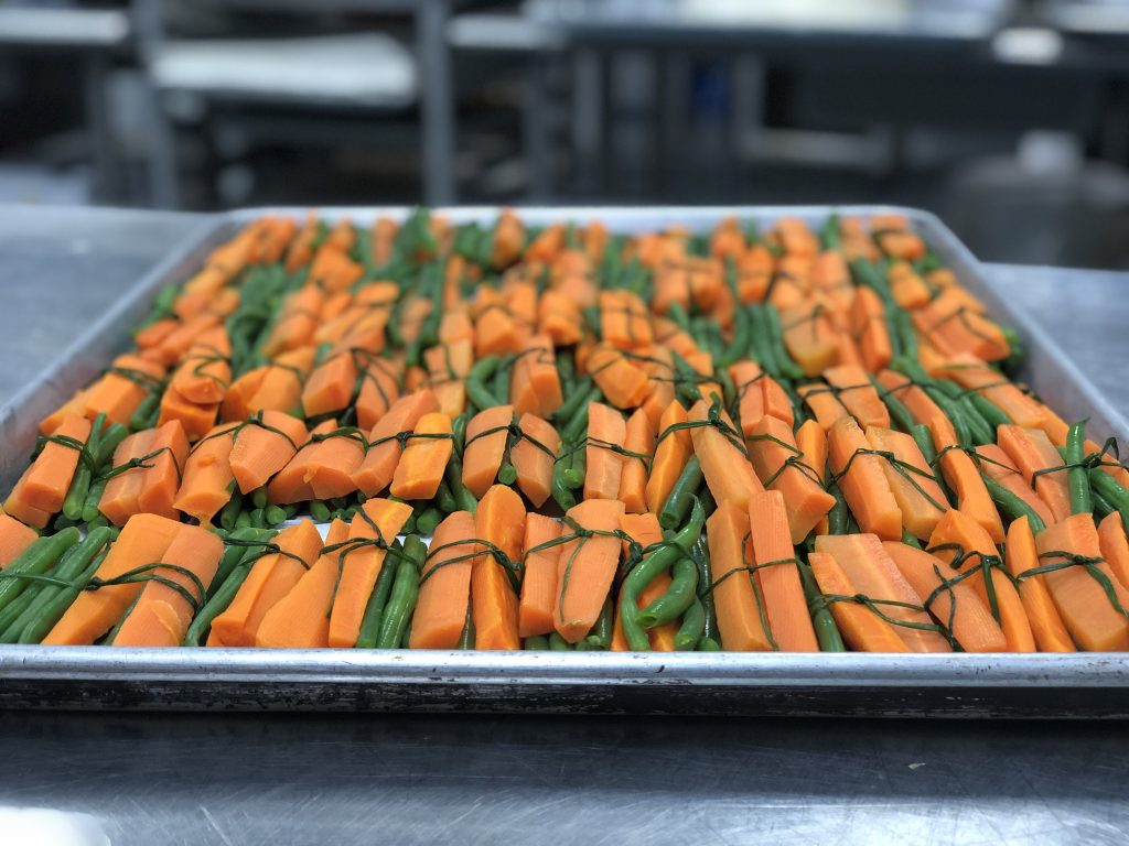 Carrot and pea bundles